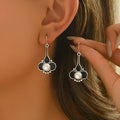 A pair of silver-coloured retro fashion earrings for women made from electroplated alloy.