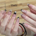 Sweet girly press-on false nails with 500 pieces of 3D heart, star, cloud, and butterfly stickers.