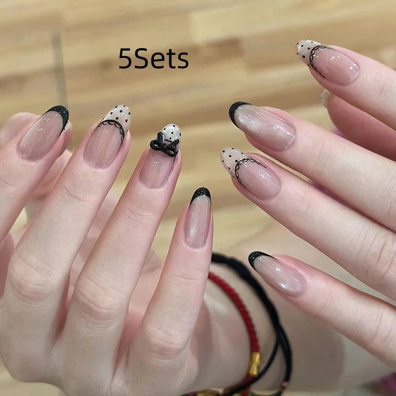 Sweet girly press-on false nails with 500 pieces of 3D heart, star, cloud, and butterfly stickers.