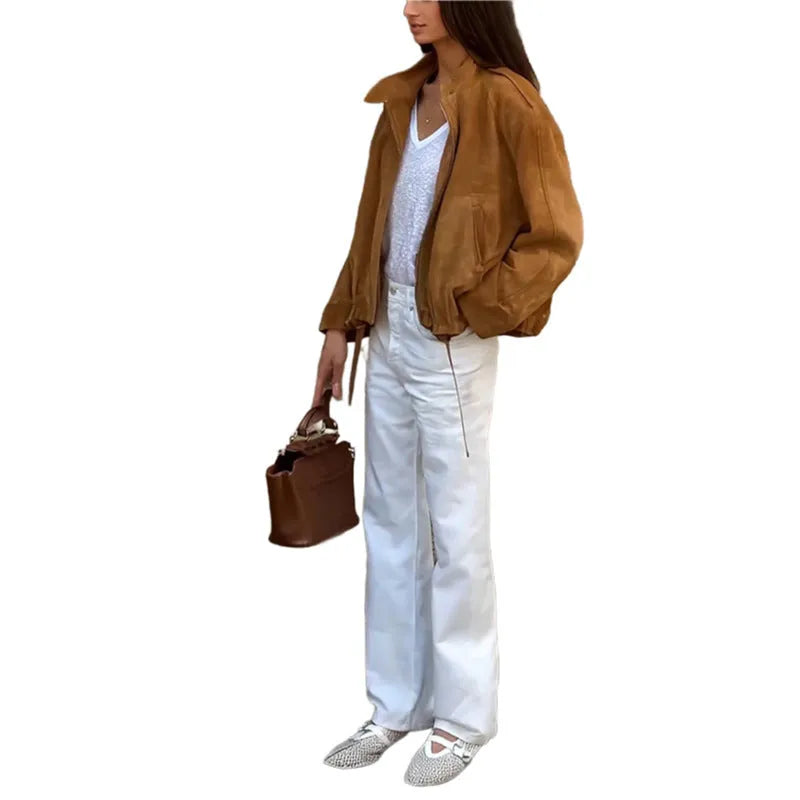 Retro loose fit solid colour polyester jacket with long sleeves on a model.