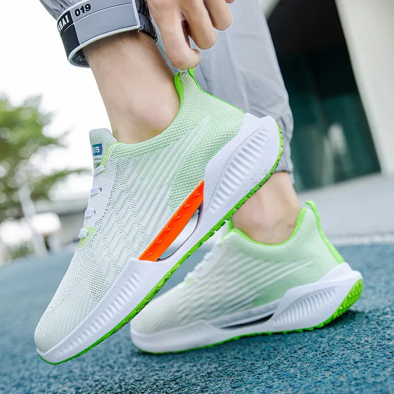 Men's blue casual mesh sports shoes with round toe and plastic sole, shown on a white background.