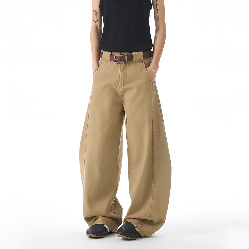 Men's brown loose fit denim jeans with straight leg and button fly