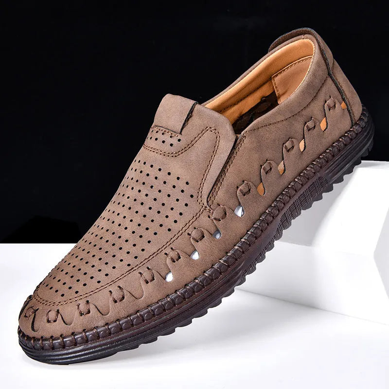 Men's brown slip-on casual shoes with a round toe and flat heel