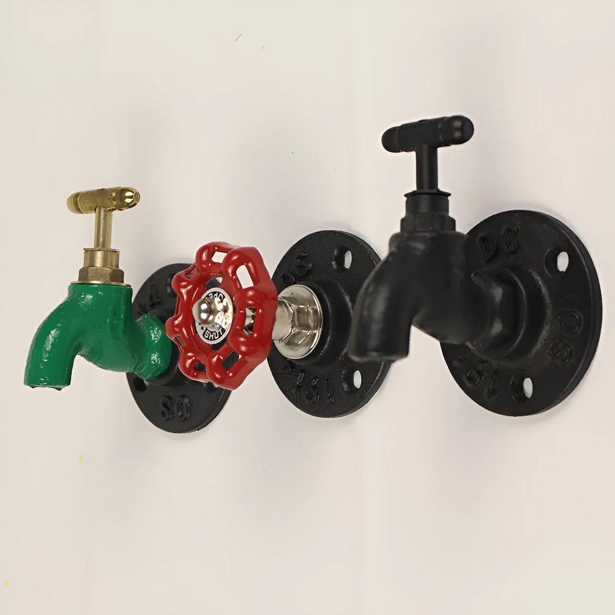 Water pipe style metal towel rack hook in black, green, or red on a white wall
