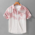 Men's light pink pure cotton loose short-sleeved cardigan-style shirt on a hanger.