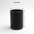 Round black leather pen holder container showing cylindrical shape and compact dimensions