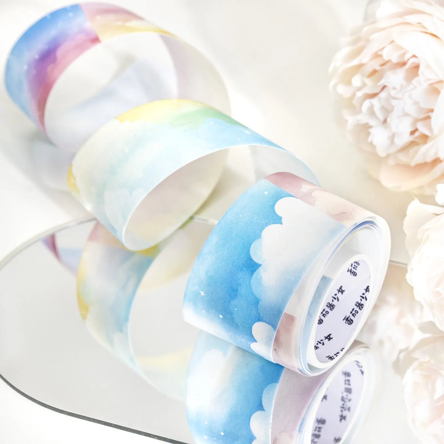 Roll of Japanese paper decorative washi tape in sky-themed colours, 30mm wide.