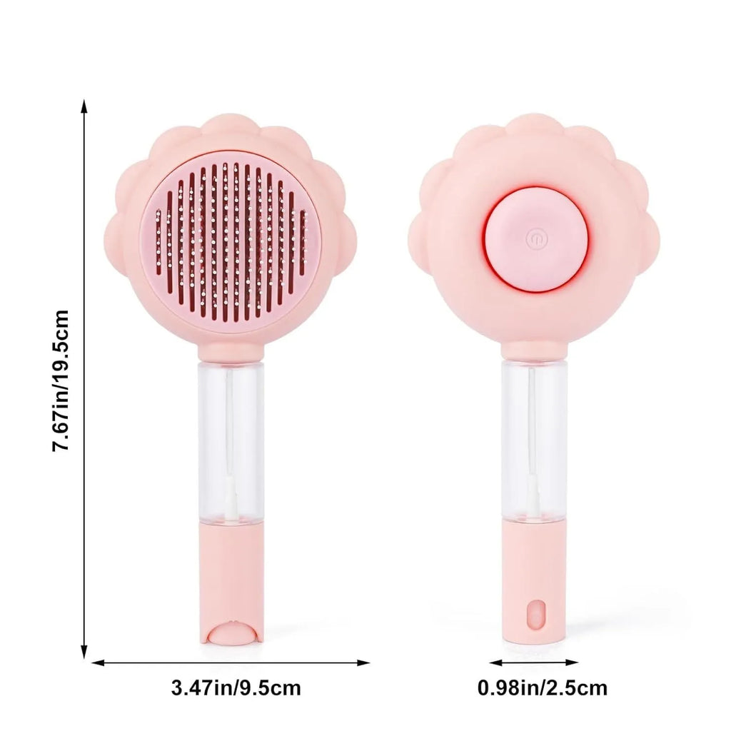 Grey spray cat brush with a release button on the handle, shown with stainless steel bristles.