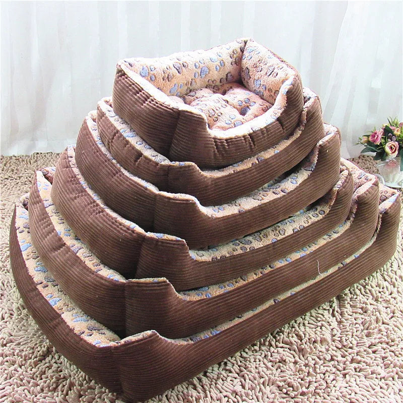 Beige plush dog bed with raised sides shown on a wooden floor.