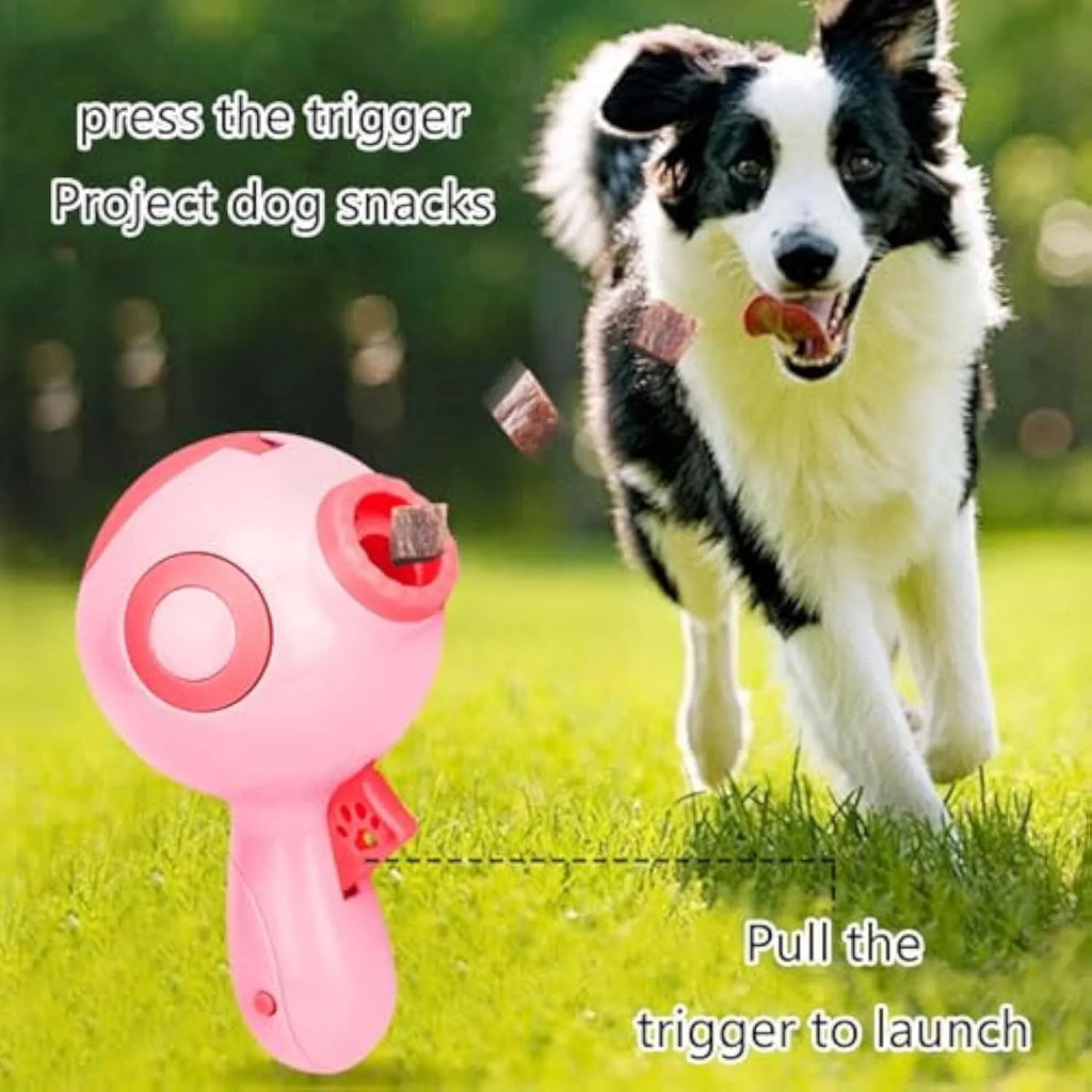 Green, orange or pink dog treat launcher toy for interactive feeding and training