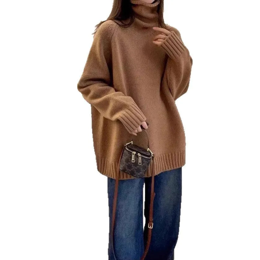 Red women's loose turtleneck sweater with a textured curling pile collar, shown in a casual setting.