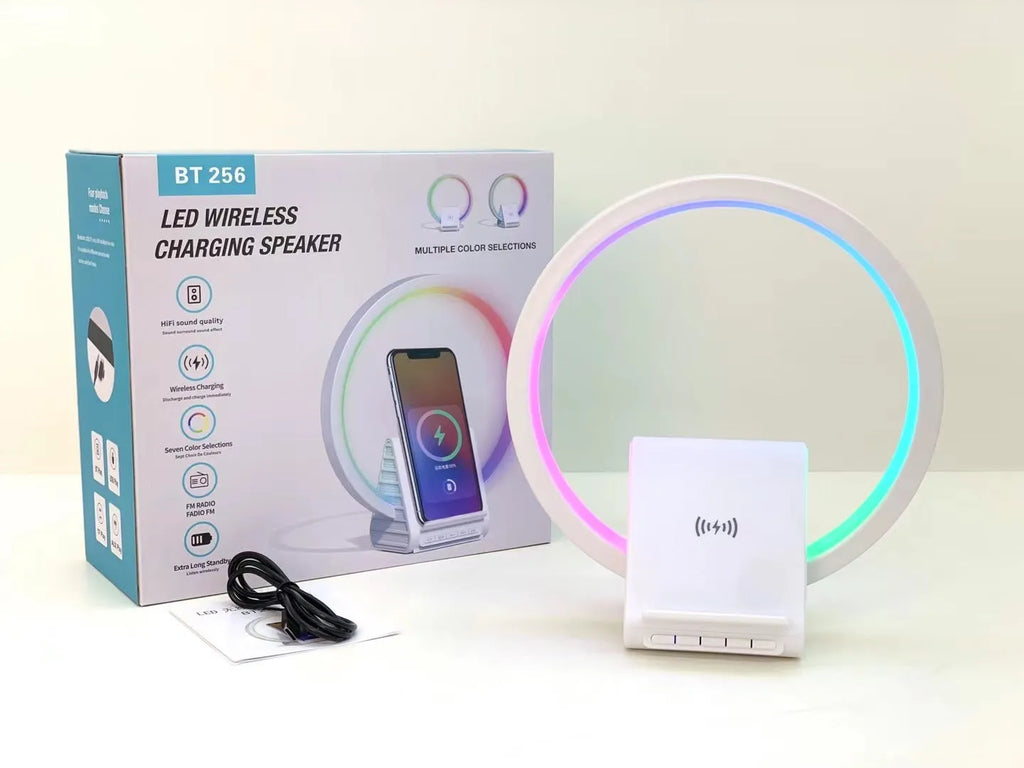 White Bluetooth speaker with ambient lighting and wireless charging pad measuring 225x200x10mm