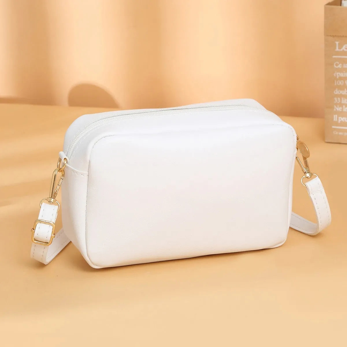 Women's solid colour PU shoulder bag with three-dimensional pockets and square suitcase shape