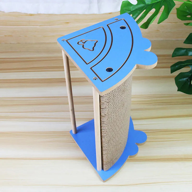 Corner cat scratching pad with hanging ball on cardboard surface