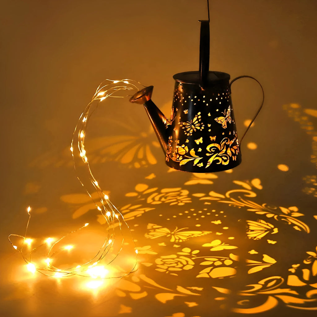 Tapered butterfly pattern iron solar garden lamp with warm white LED lighting
