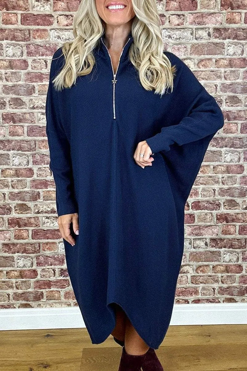Women's solid colour loose knitted dress with raglan sleeves on a hanger