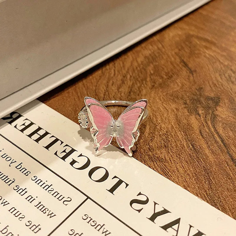 Butterfly women's copper ring with adjustable split ring design showing oil-drip colour treatment