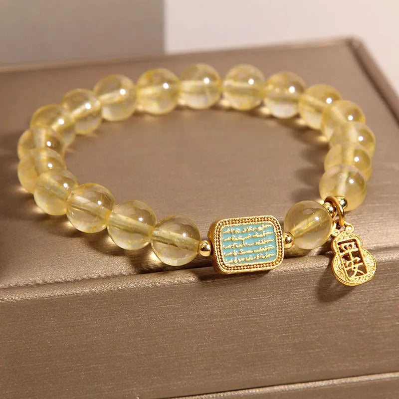 Women's natural yellow citrine crystal bracelet with rhinestone decorative details