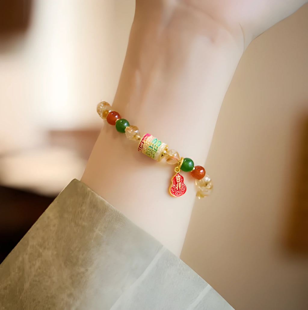 Hand-woven citrine crystal bracelet with five-sutra geometric design in fresh styling