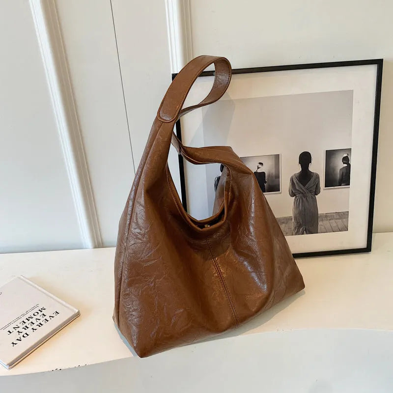 Soft leather shoulder bag in street trend style with large capacity design