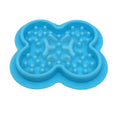 Silicone slow feeder lick mat for pets in blue, with textured surface and raised edges.