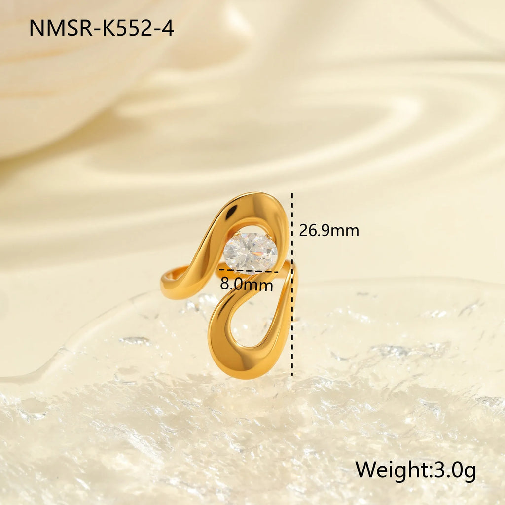 Geometric stainless steel zircon ring with open mouth adjustable design on a hand.