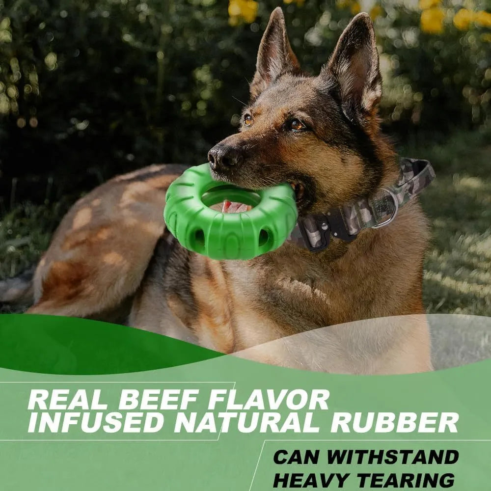 Blue natural rubber tyre-shaped dog chew toy with oval openings for treat dispensing.