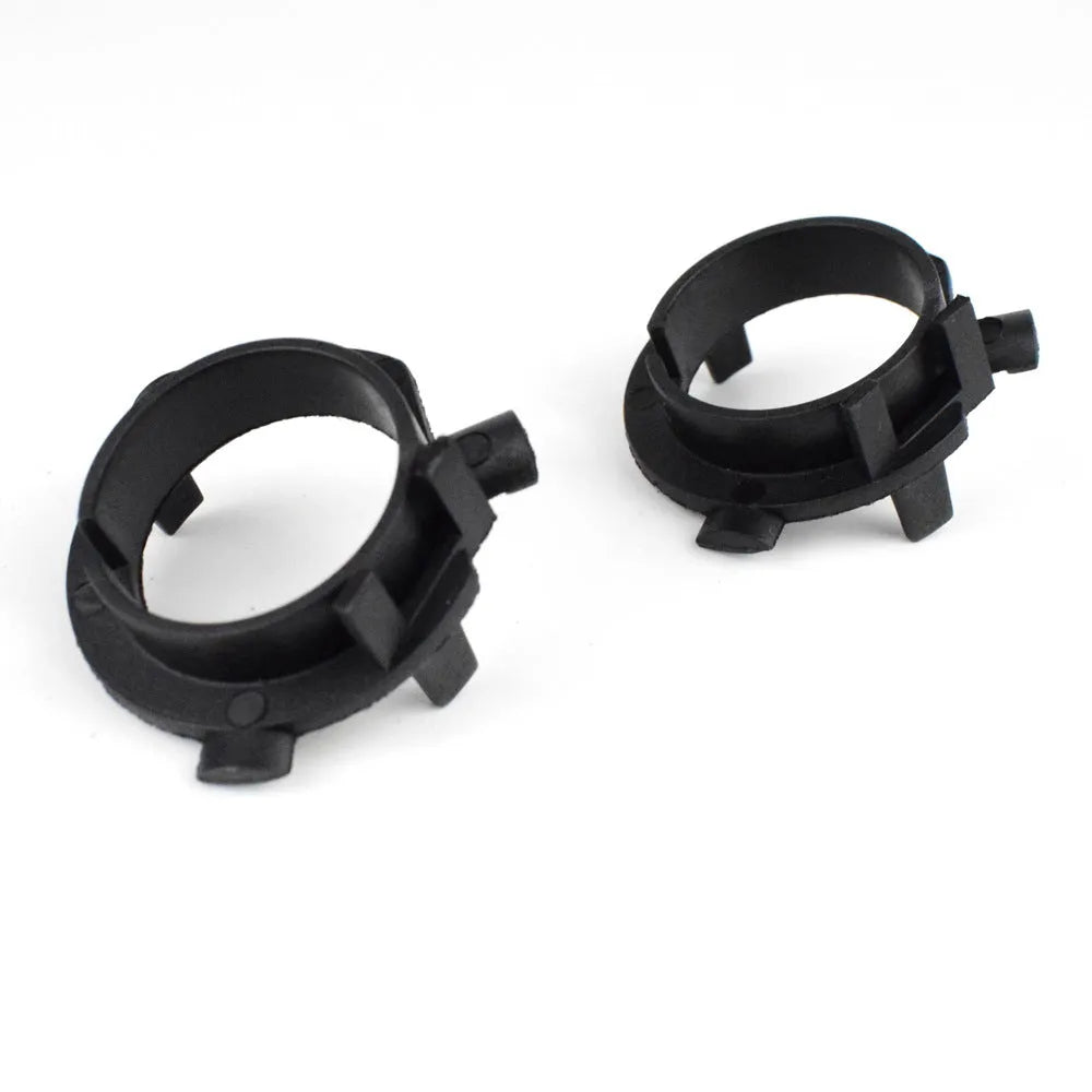 Black ABS plastic car LED headlight card holder for compatible vehicle models.