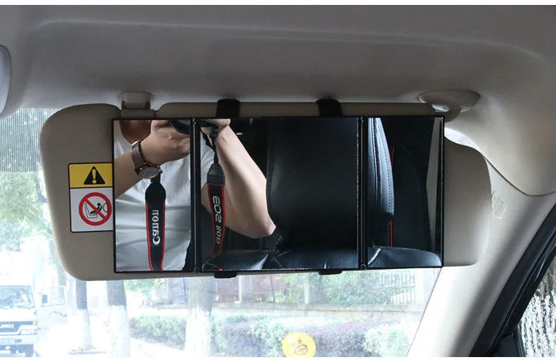 Silver car folding makeup mirror shown both closed at 15.5cm and open at 30.5cm width