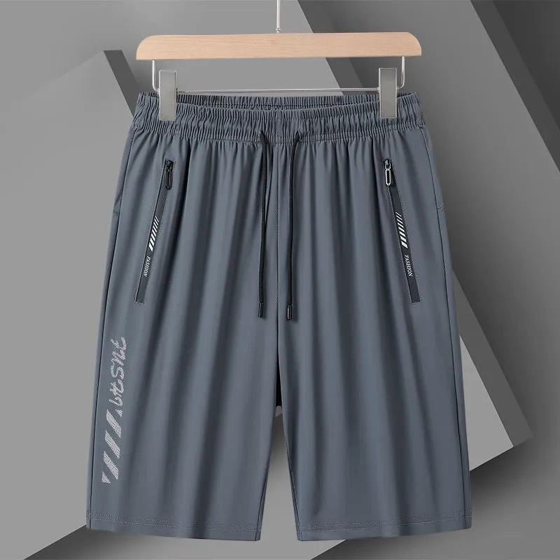 Men's quick-drying nylon sports shorts in black, loose fit with fifth pants length