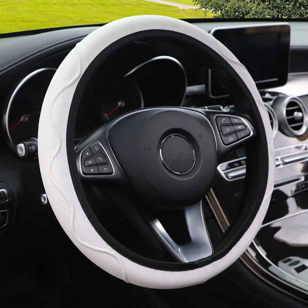 Elastic PU leather steering wheel cover with embossed corrugated texture, shown in a black and red two-tone colour option.