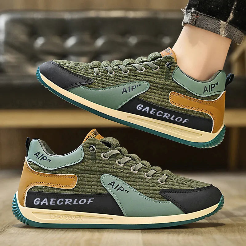 Men's grey and green mesh running shoes with lace-up front and low-top design