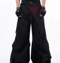 Boy modelling black wide-leg Korean-style casual trousers.