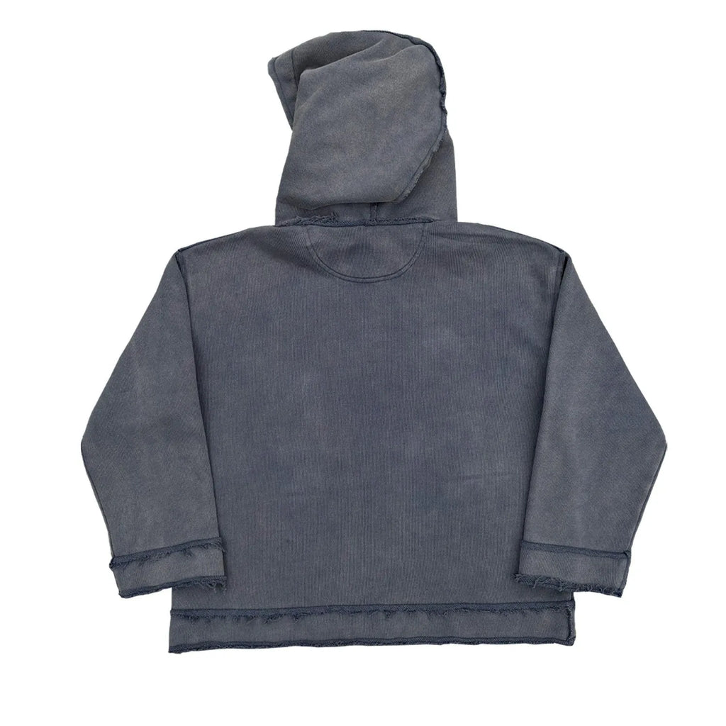 Dark blue back-to-front hoodie sweater on a model
