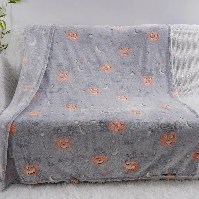 Cartoon-style flannel blanket for children shown as an air conditioner cover and bed throw.