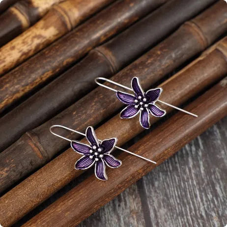 Purple flower-shaped alloy earrings with retro design and electroplated finish