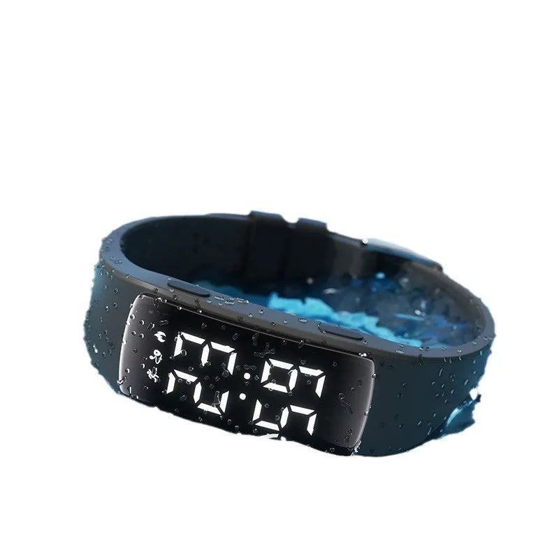 Vibration alarm smartwatch with LED display on a silicone strap, shown in a colour option.