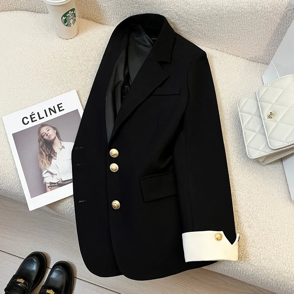 Korean style loose fit women's coat in milky white, mid-length with long sleeves and pockets.
