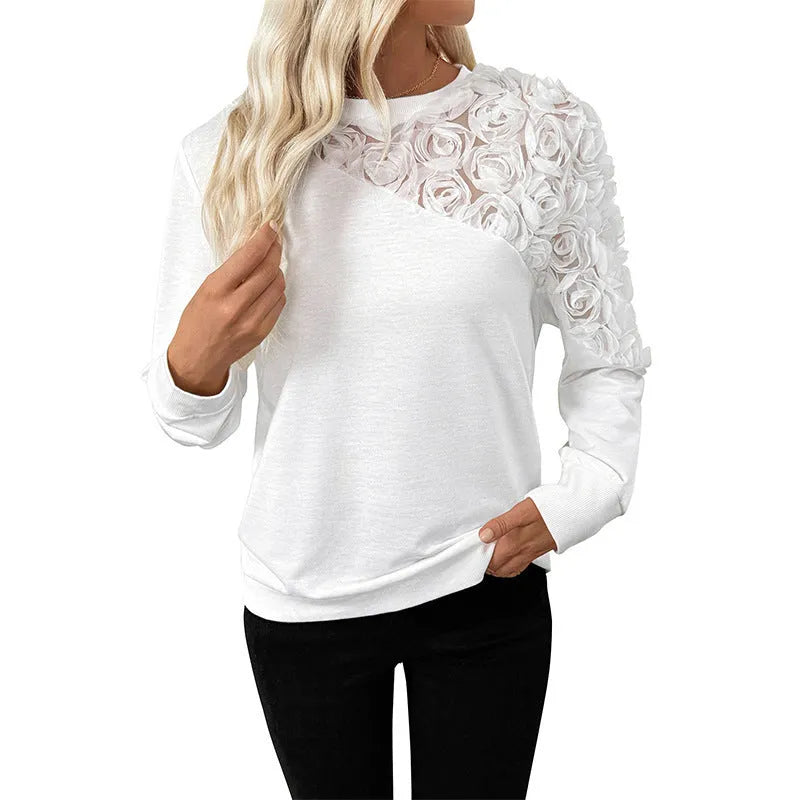 White floral pattern long sleeve women's top with loose fit design