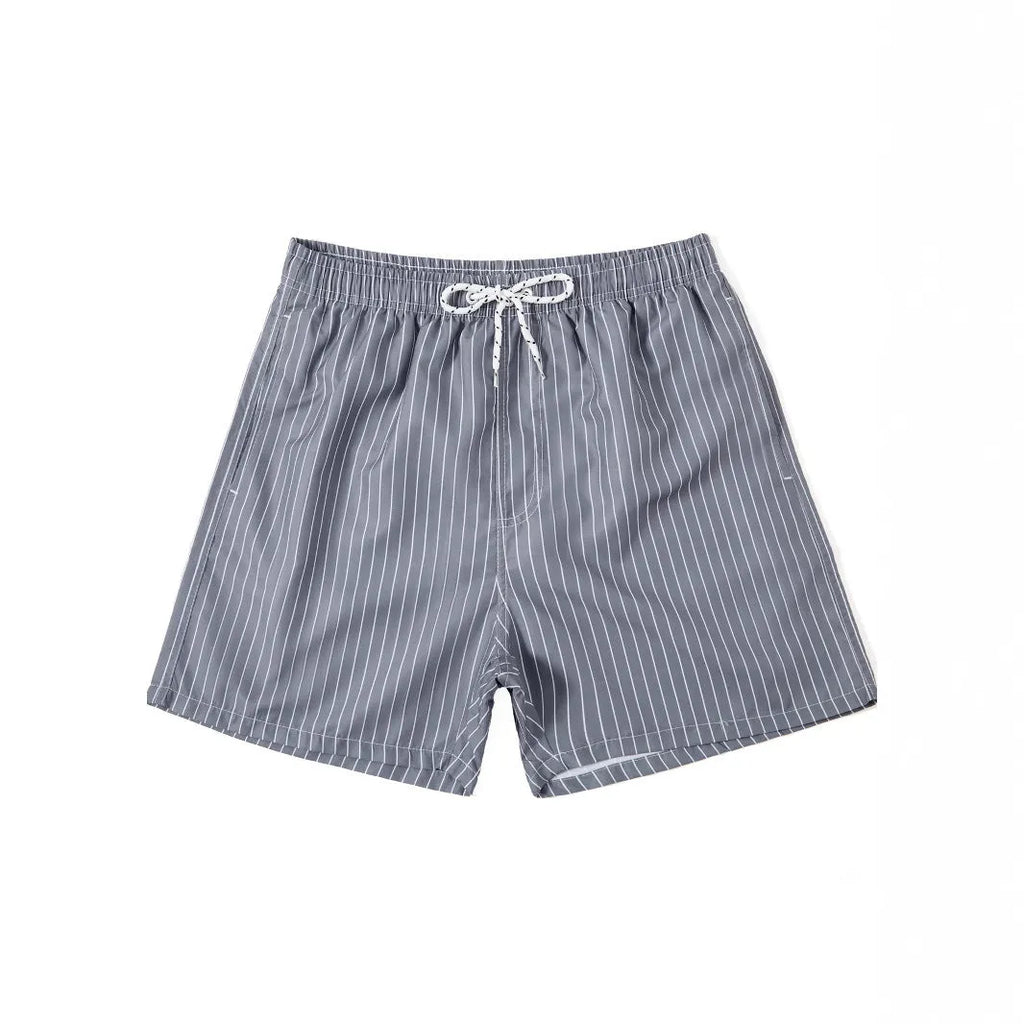 Polyester striped beach shorts with triangle lining in navy blue colour with straight leg openings