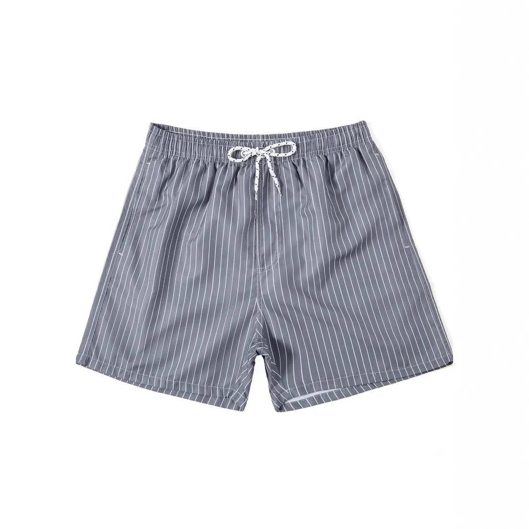 Polyester striped beach shorts with triangle lining in navy blue colour with straight leg openings