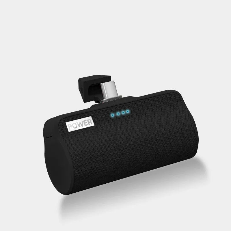 Cylindrical aluminium shell universal power bank in black, green, pink, or white for mobile phone charging.