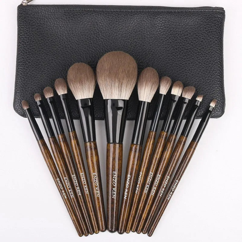 12 piece makeup brush set with wooden handles and soft artificial bristles in a PU travel bag