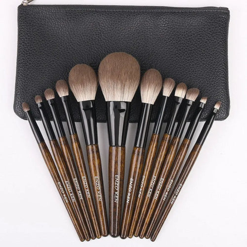 12 piece makeup brush set with wooden handles and soft artificial bristles in a PU travel bag