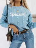 Blue crew neck knitwear pullover with embroidered letters in street fashion style