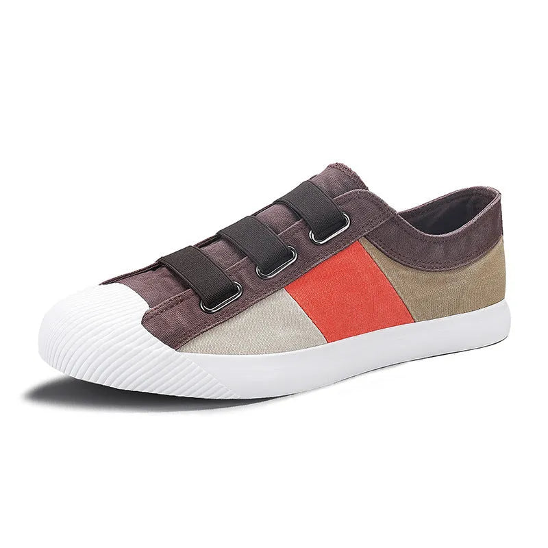 Men's low-top canvas sneaker with elastic band closure in beige colour with contrast stitching.