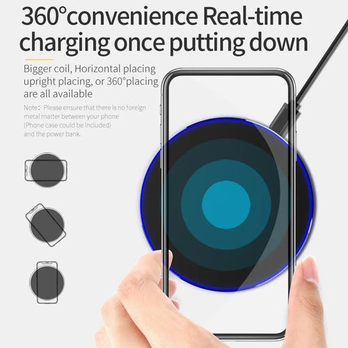 Black ultra-thin 9V QI wireless fast charger with USB cable on a desk.