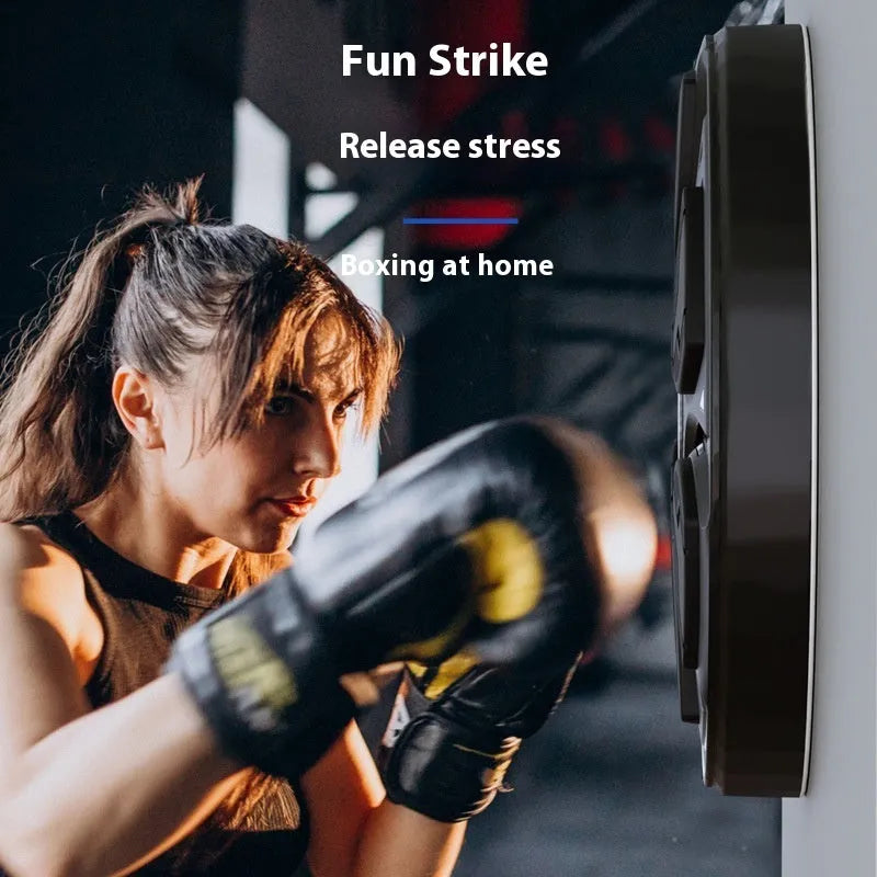 Black wall-mounted boxing target with boxing gloves for home training and Sanda practice