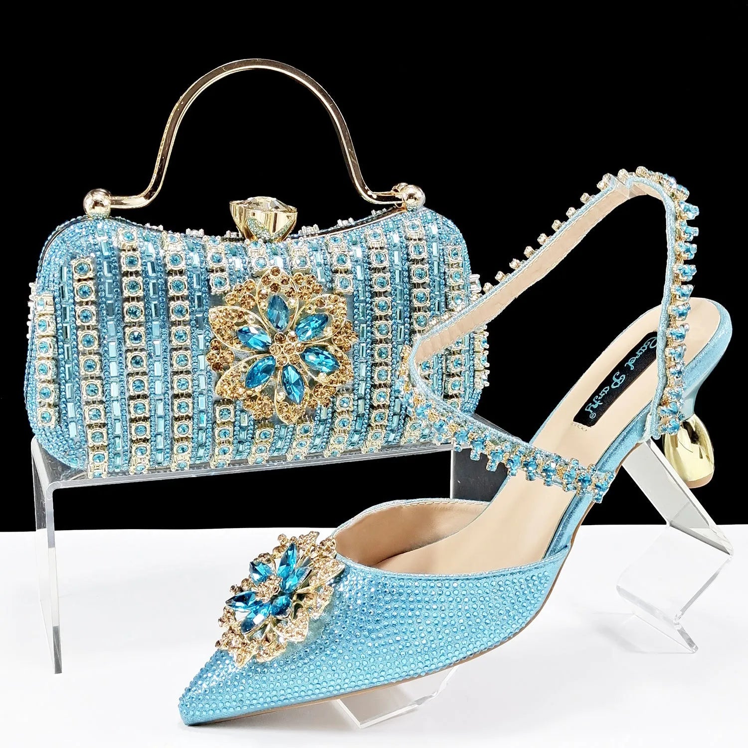 Women's black high-heel shoe and matching clutch bag set with floral drill buckle and ankle chain decoration