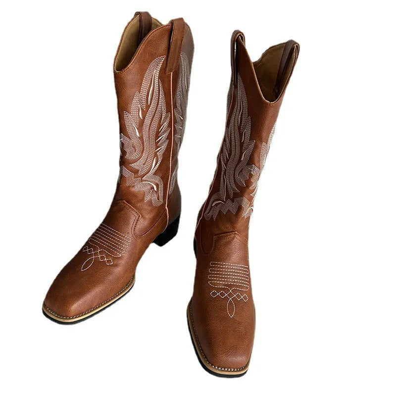 Brown women's embroidered mid-calf Martin boots with a square heel and leather lining.